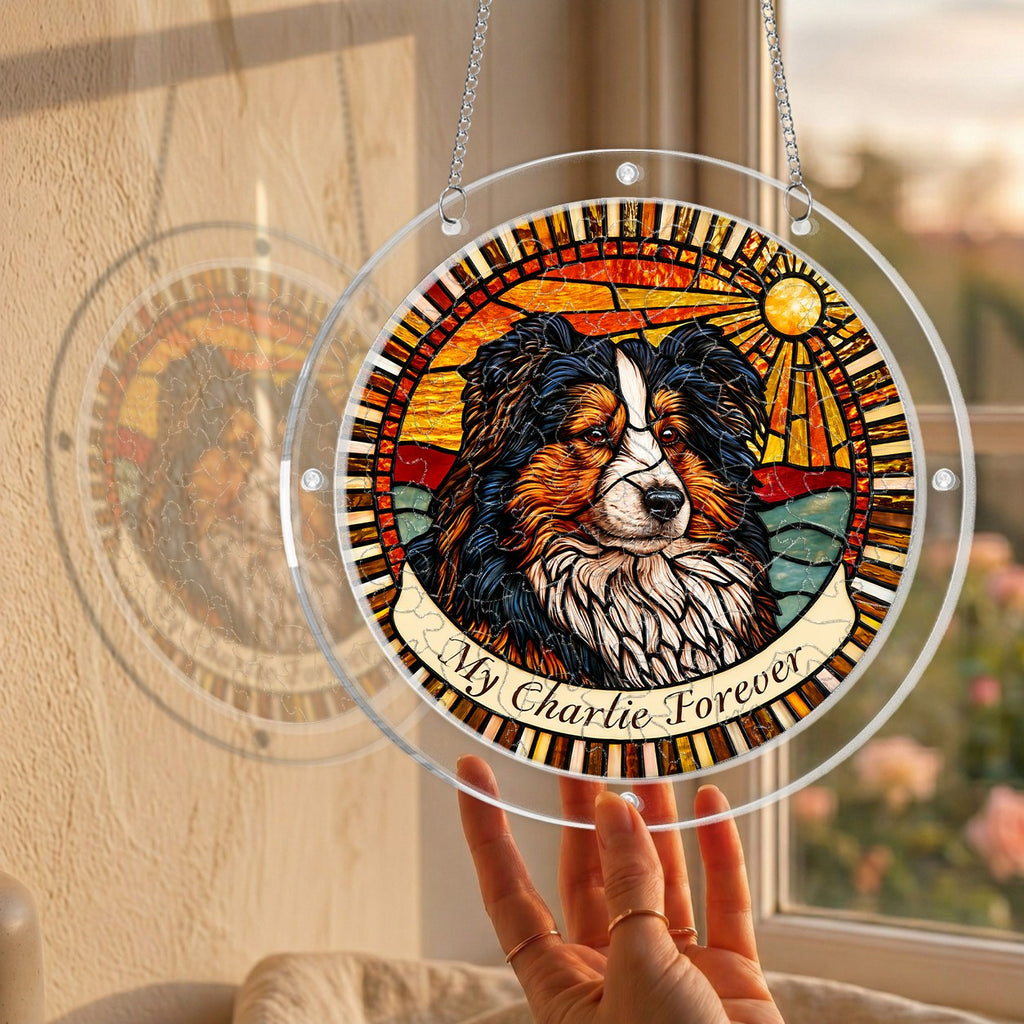 Dog memorial puzzle suncatcher held up to a sunlit window