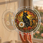 Cat memorial puzzle suncatcher held up to a sunlit window