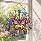 Butterfly web suncatcher catching sunlight in a window