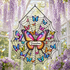 Personalized butterfly suncatcher hanging in a conservatory with wisteria