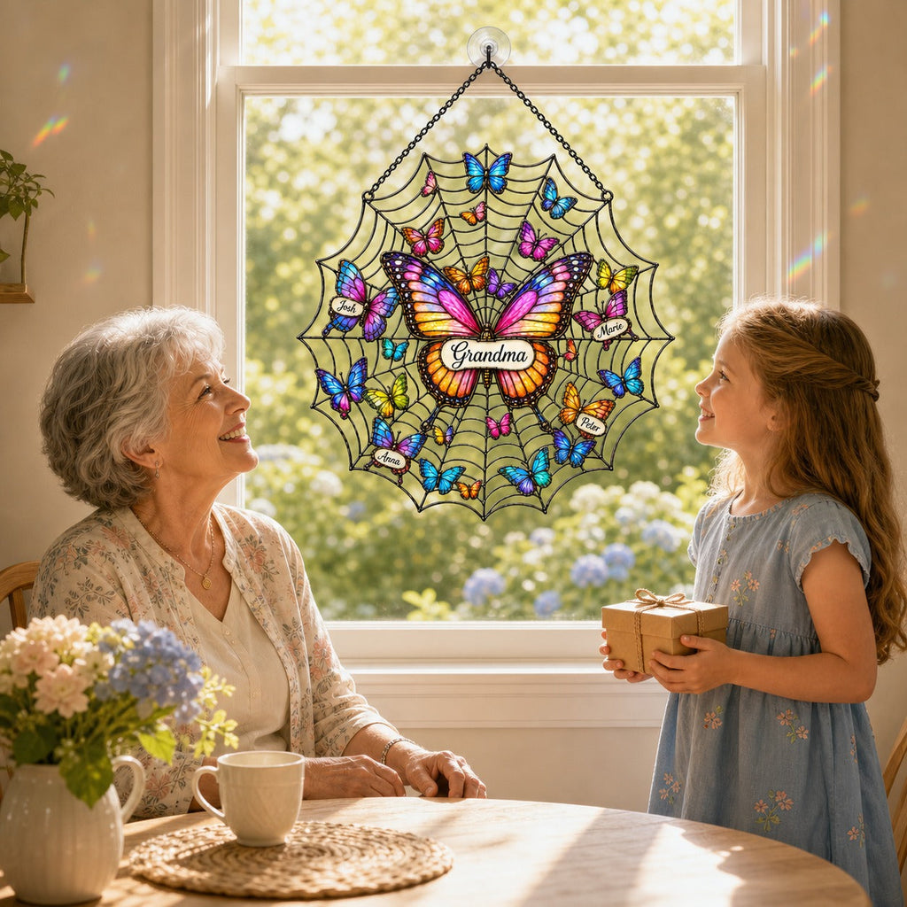 Grandma and granddaughter admiring the personalized butterfly suncatcher