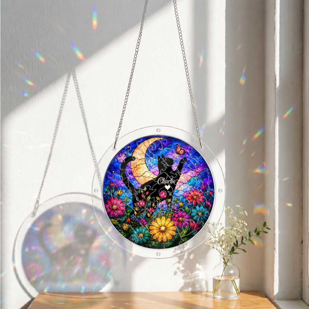 Cat memorial puzzle suncatcher catching colorful sunlight
