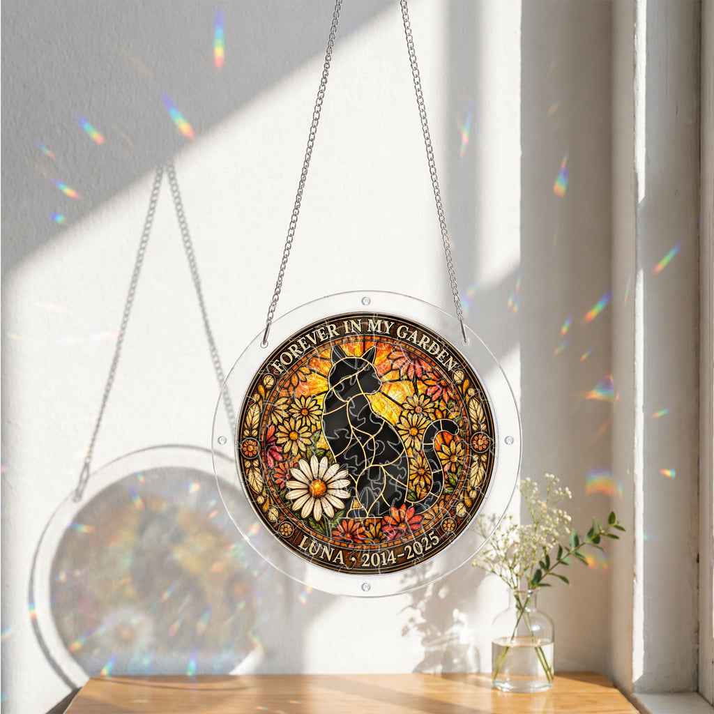 Cat memorial puzzle suncatcher catching colorful sunlight