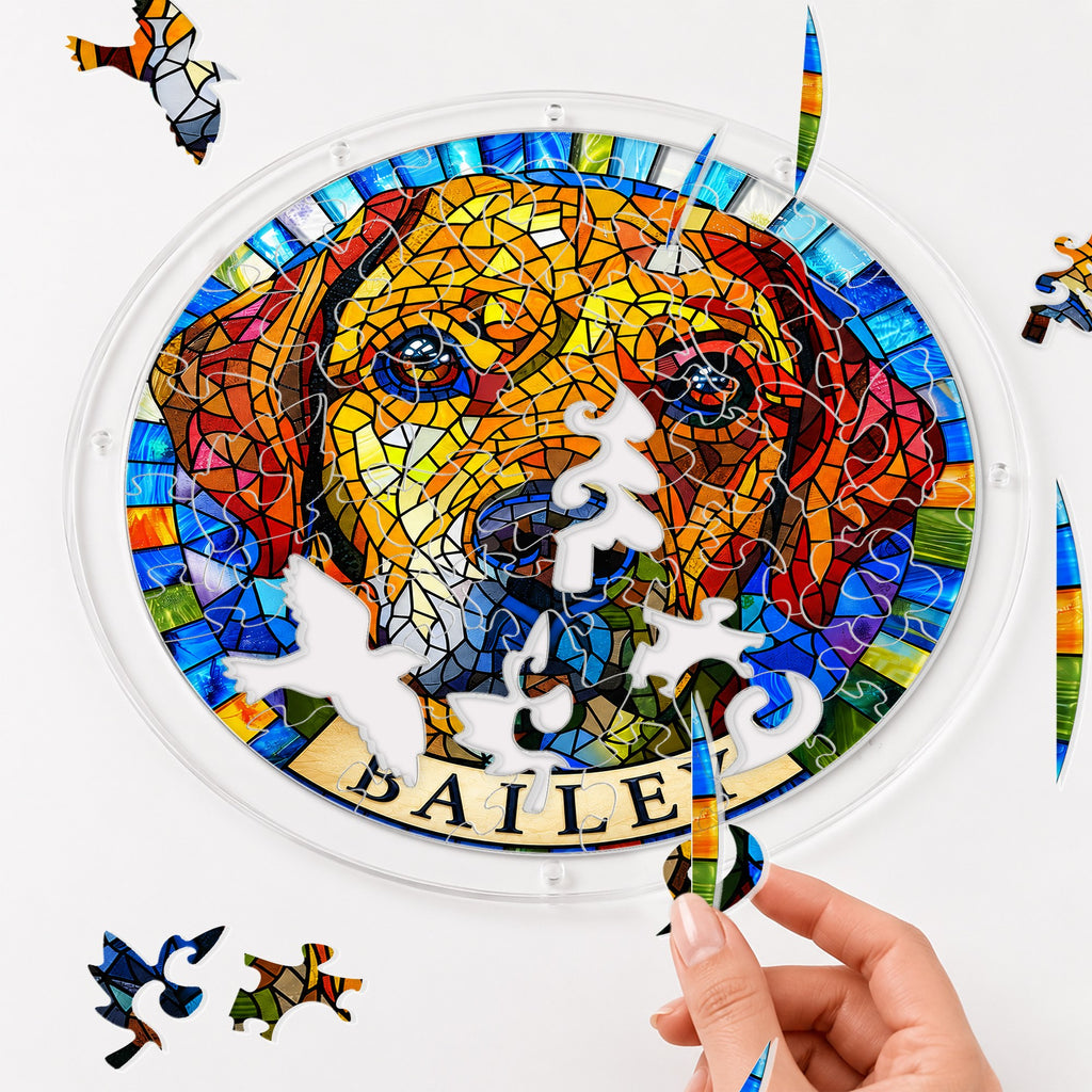 Hands assembling the rainbow mosaic dog memorial acrylic puzzle suncatcher pieces