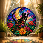 Cat memorial puzzle suncatcher glowing in a sunny window