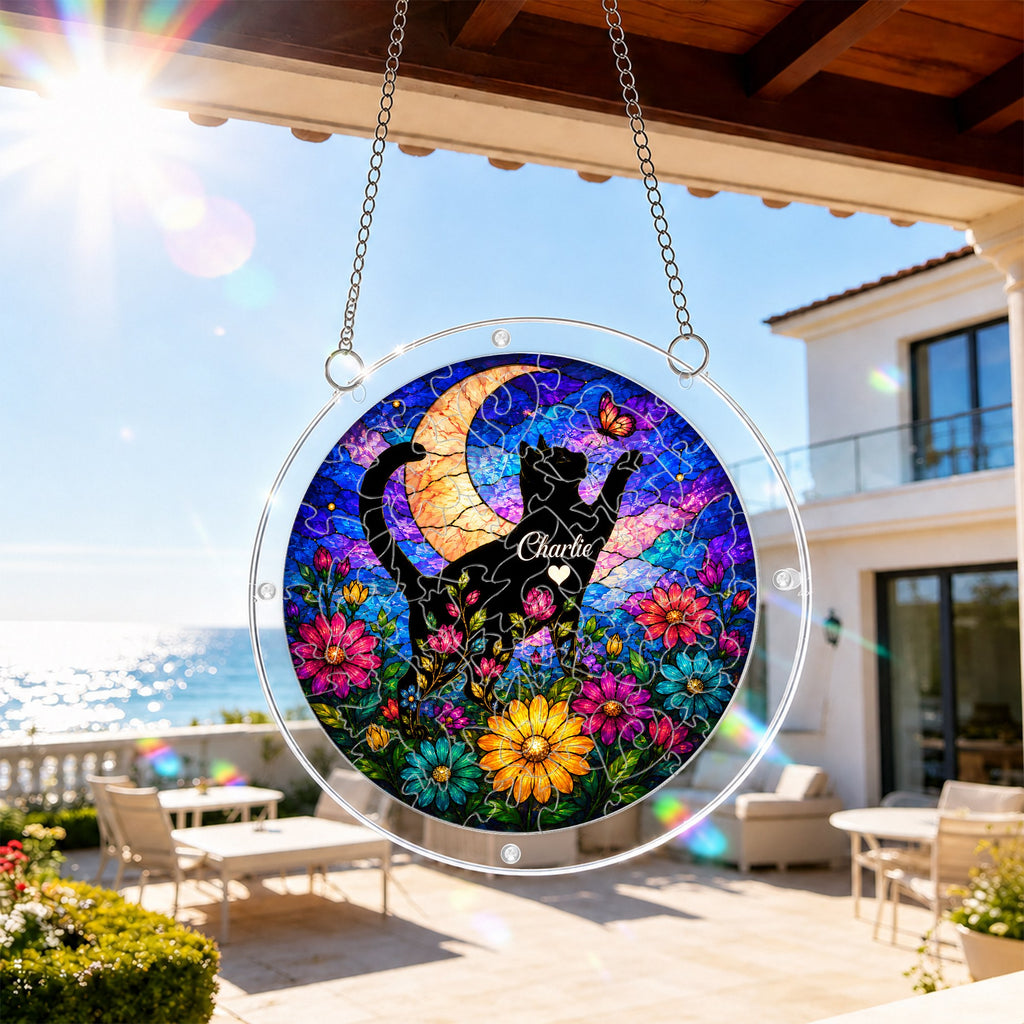 Cat memorial puzzle suncatcher hanging on a sunny patio