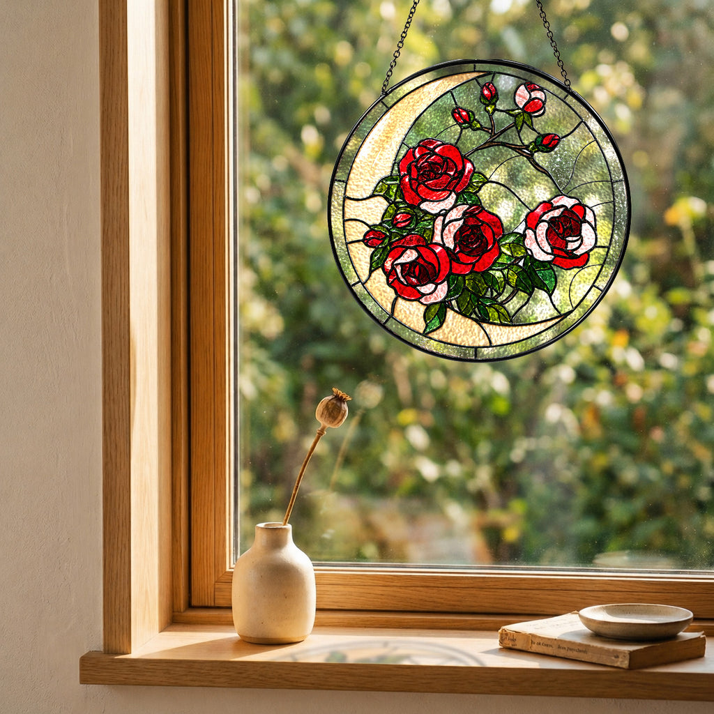 Red rose suncatcher in a cozy window with a small vase and soft natural light