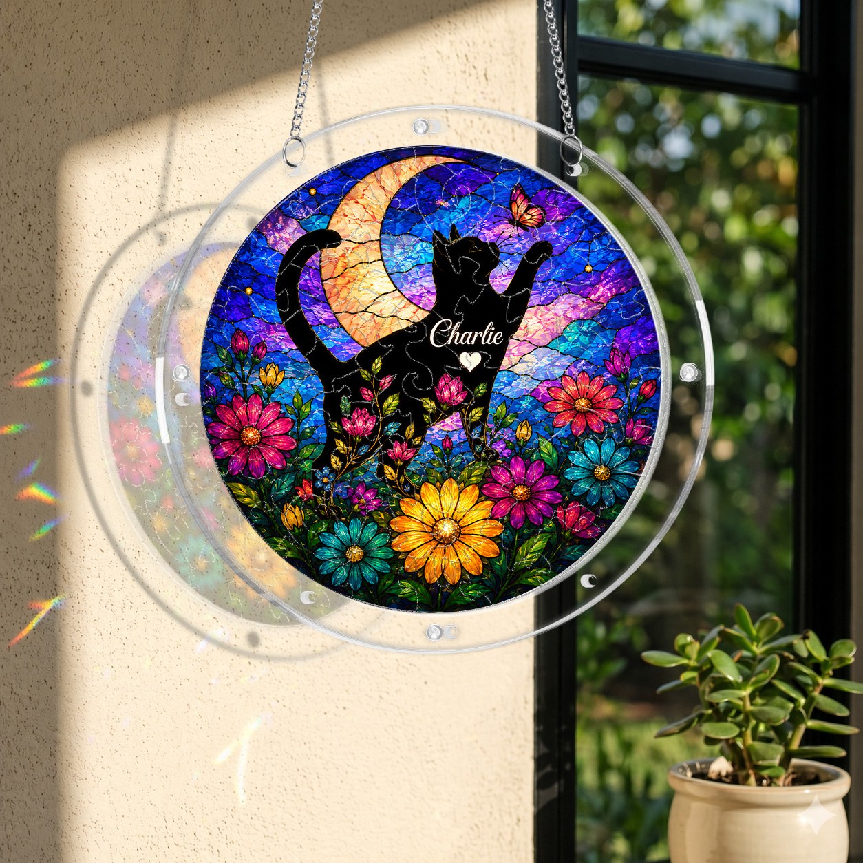 Cat memorial puzzle suncatcher in a bright window