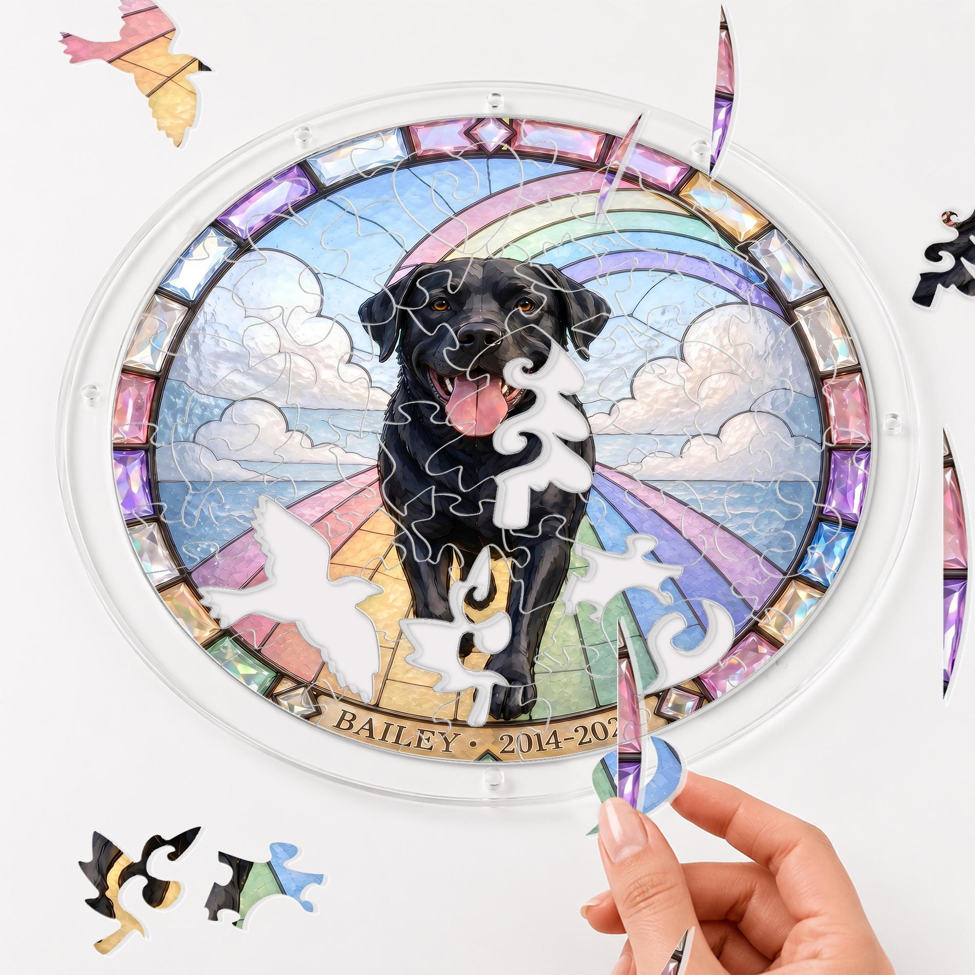 Hands assembling the black Labrador memorial puzzle suncatcher puzzle pieces