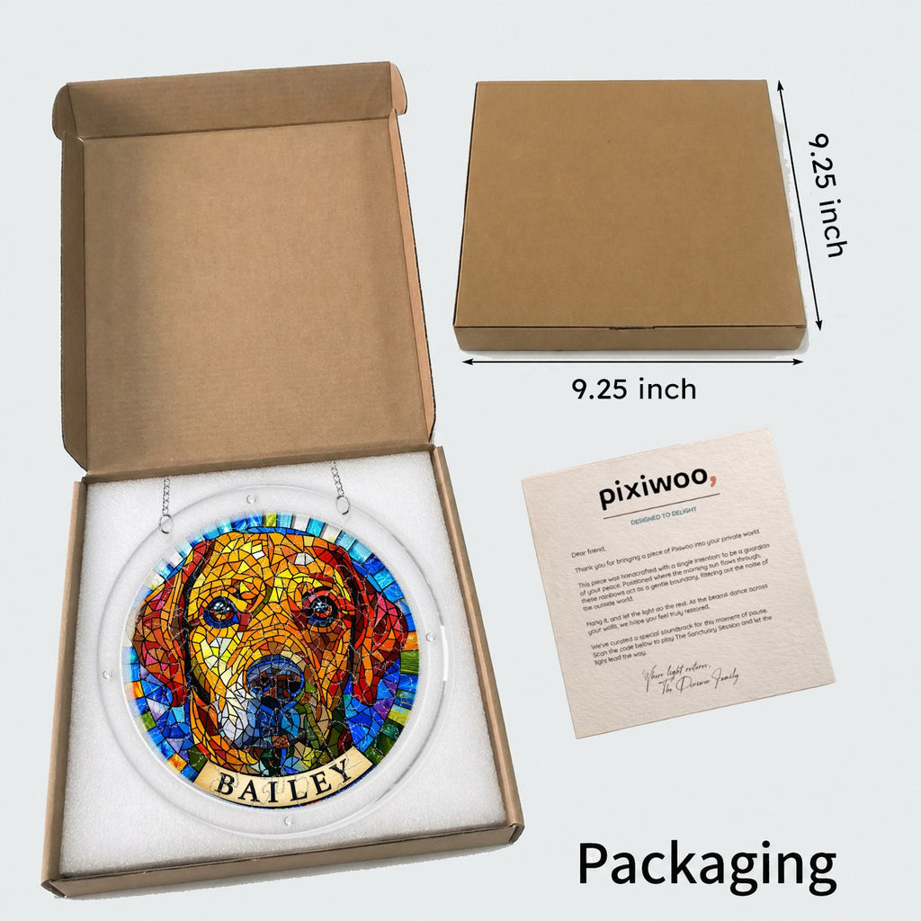 Open kraft gift box showing the rainbow mosaic dog memorial suncatcher with a size reference