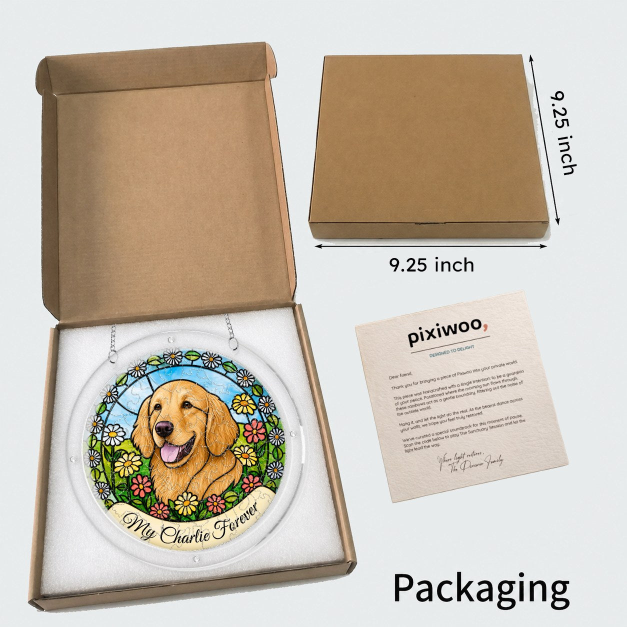 Open kraft gift box showing the daisy garden dog memorial suncatcher with a size reference