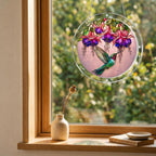 Hummingbird fuchsia puzzle suncatcher mounted on a clear round acrylic frame