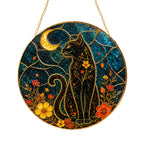 Black cat crescent moon stained glass suncatcher glowing with sunlight through the glass