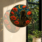 Close-up detail of Black cat and red poppies stained glass suncatcher