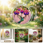 Hummingbird fuchsia puzzle suncatcher on its hanging chain against a white background