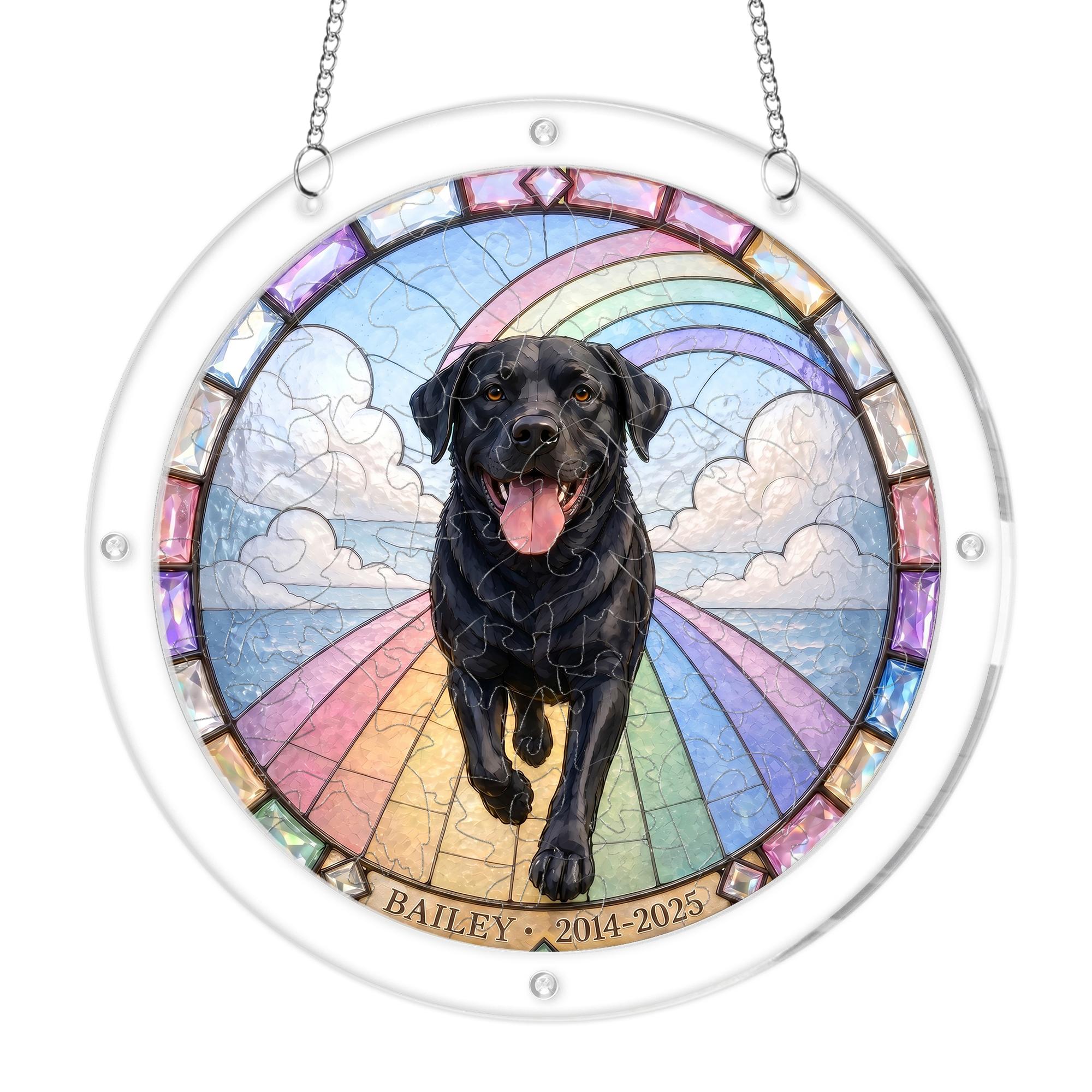 Black Labrador memorial puzzle suncatcher on its hanging chain against a white background