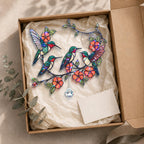 Decorative arcrylic suncatcher with colorful birds and flowers in a box