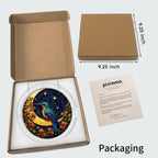 Hummingbird crescent-moon puzzle suncatcher shown in its kraft gift box