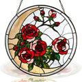 Red rose stained glass suncatcher with crescent moon and black frame on a white background