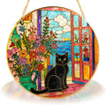 Black cat window stained glass suncatcher displayed as window decor