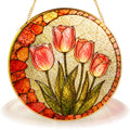 Pink tulip stained glass suncatcher displayed as window decor