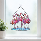 Flamingo flock holographic suncatcher displayed indoors as a nature-inspired window hanging