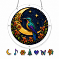 Hummingbird and crescent moon acrylic puzzle suncatcher stained-glass design close-up