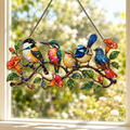 Close-up detail of the colorful birds on a branch holographic acrylic suncatcher's wavy acrylic and hologram texture