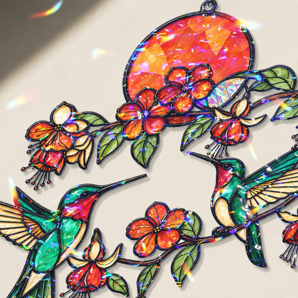 Close up of hummingbird and fuchsia flower artwork with broken glass hologram reflections