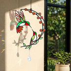 Hummingbird cherry blossom moon holographic acrylic suncatcher hanging by a sunny window with rainbow reflections