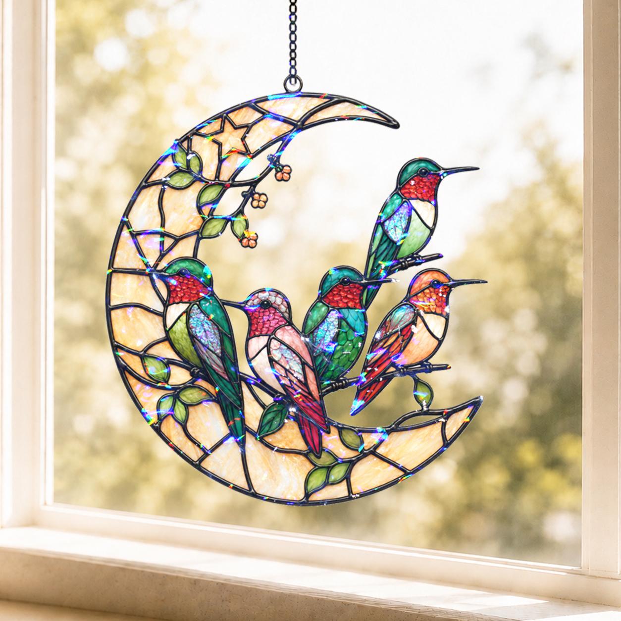 Crescent moon hummingbird holographic acrylic broken glass suncatcher with crystal charm hanging in a sunlit window.