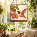 Square hummingbird fuchsia stained glass suncatcher hanging in a bright sunlit window, surrounded by green plants and cozy home decor.