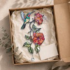 Hummingbird hibiscus holographic acrylic suncatcher packaged in a gift box with tissue paper
