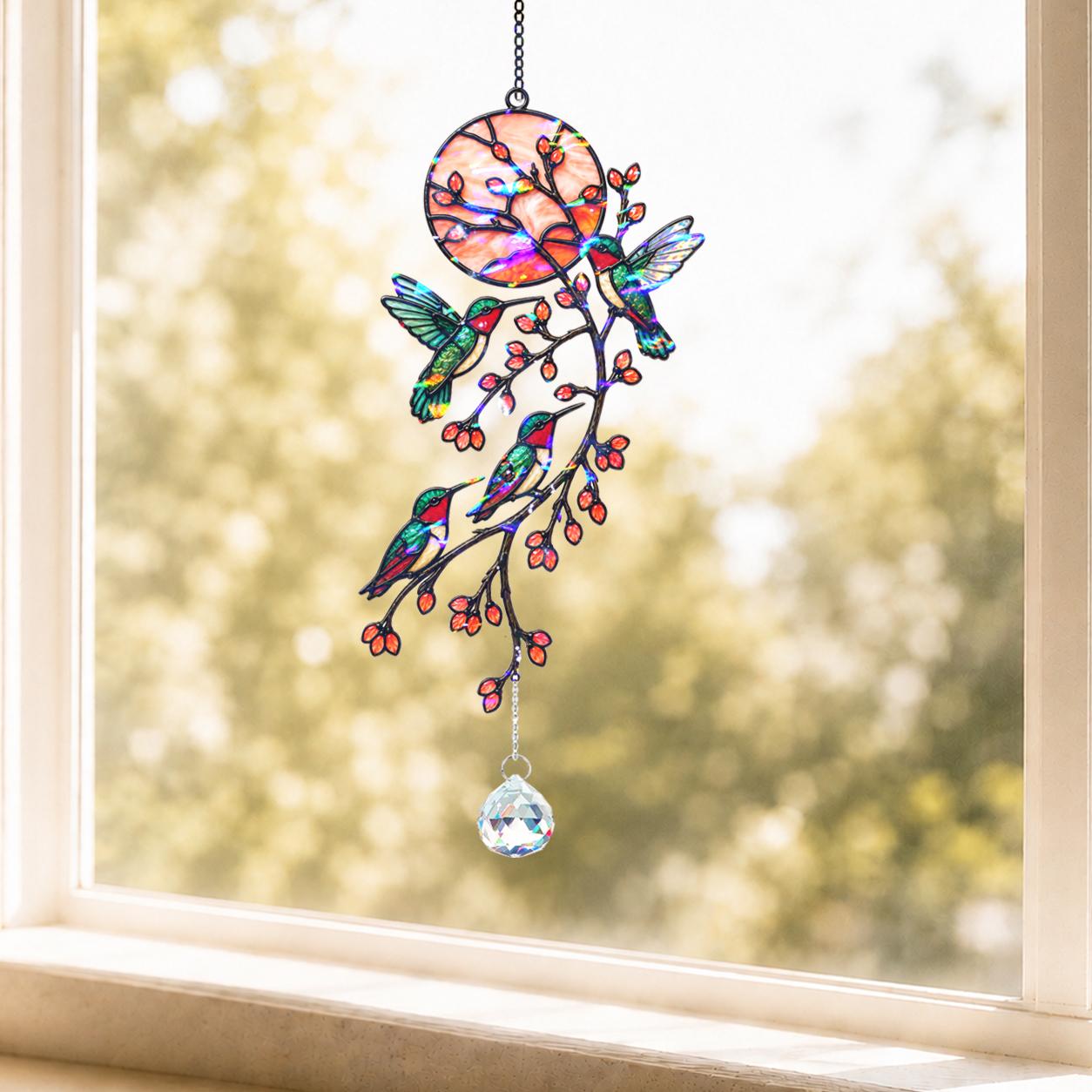 Vertical hummingbird and mushroom vine holographic acrylic broken glass suncatcher with crystal charm hanging in a sunlit window.