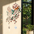 Hummingbird holographic acrylic suncatcher hanging by a sunny window with soft shadow reflections