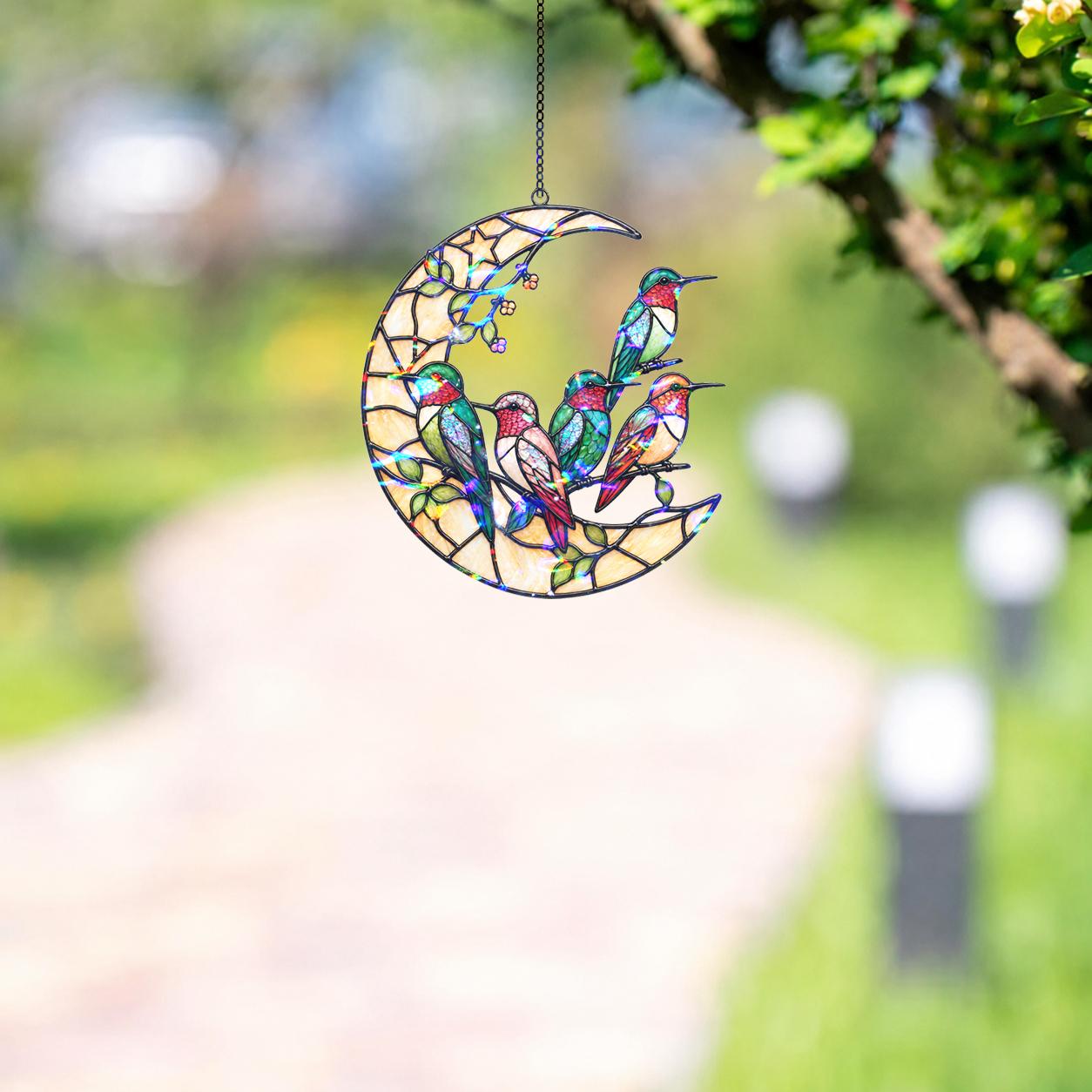 Moonlit hummingbird garden holographic acrylic suncatcher hanging by a sunny window with soft rainbow reflections