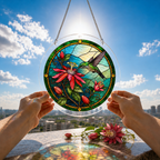 Hummingbird floral puzzle suncatcher held outdoors against a bright blue sky and garden background