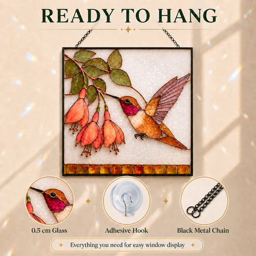 Ready-to-hang feature image for the hummingbird fuchsia stained glass suncatcher showing the product, adhesive hook, and black metal hanging chain.