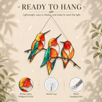 Ready-to-hang product image of the Triple Hummingbirds holographic acrylic suncatcher with broken-glass hologram acrylic, suction cup, and metal hanging chain.