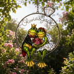 Frog wedding couple ring suncatcher hanging outdoors among garden greenery