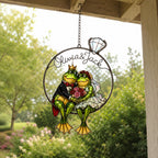 Personalized frog wedding suncatcher hanging on a covered porch