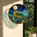 Sea turtle stained glass suncatcher hanging near a sunny window with colorful light reflection on the wall