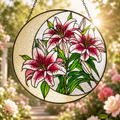 Stained glass panel with pink lilies in a garden setting