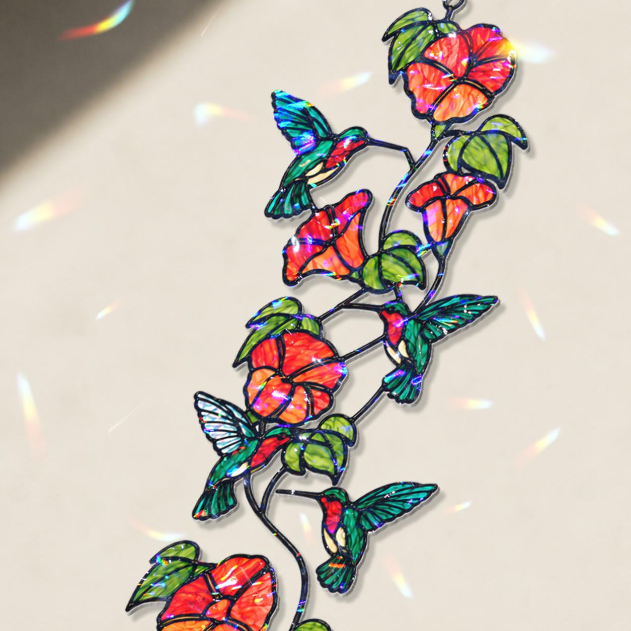 Close-up view of the colorful hummingbird and flower vine artwork on the holographic broken glass acrylic suncatcher.