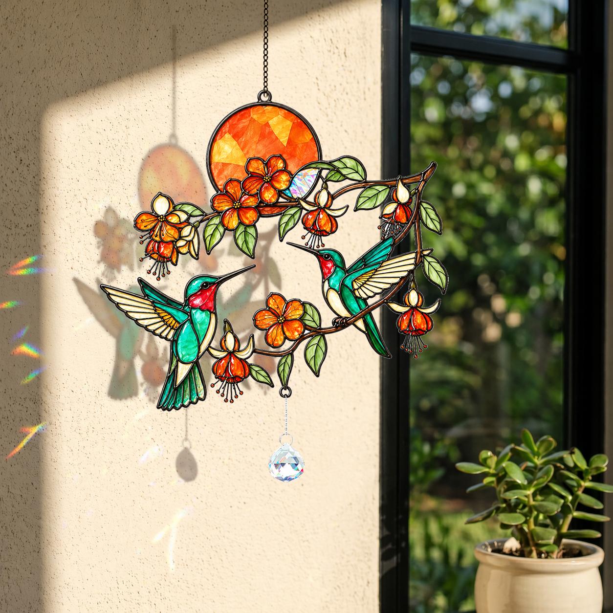 Hummingbird mushroom holographic acrylic suncatcher displayed beside a bright window with soft natural light and greenery.