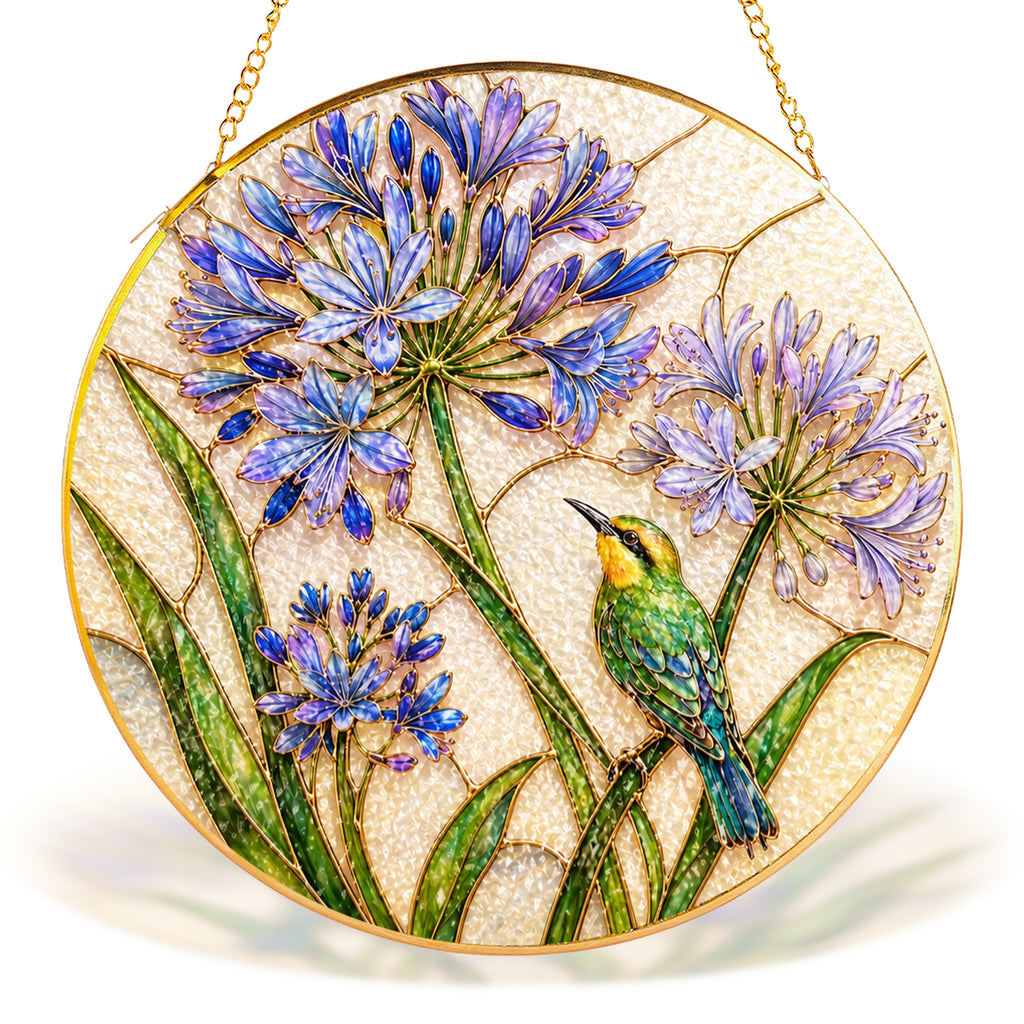 Blue agapanthus bird gold frame suncatcher in a sunny window