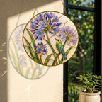 Agapanthus bird suncatcher with colorful light reflection
