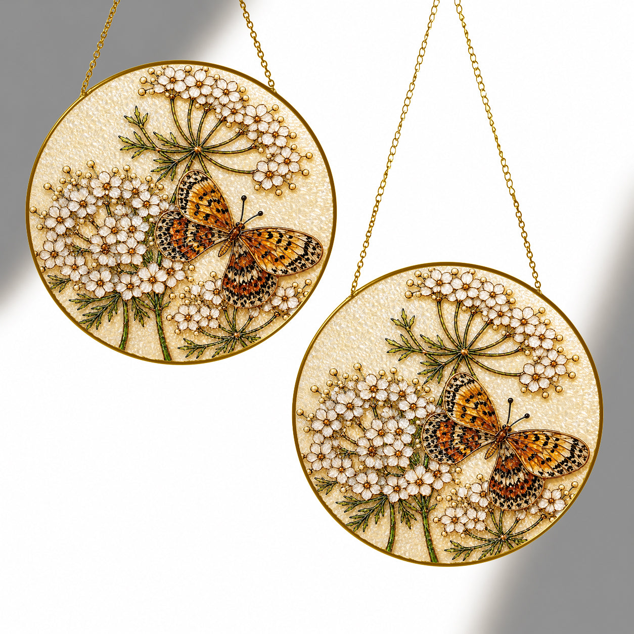 Butterfly white flowers suncatcher shown in two sizes