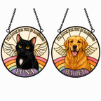 Two pet memorial pendants featuring a black cat named Luna and a golden retriever named Bailey with rainbow designs in black frame