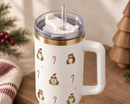 Clear twist-off lid with rotating cover, straw and gold rim on the white frog tumbler